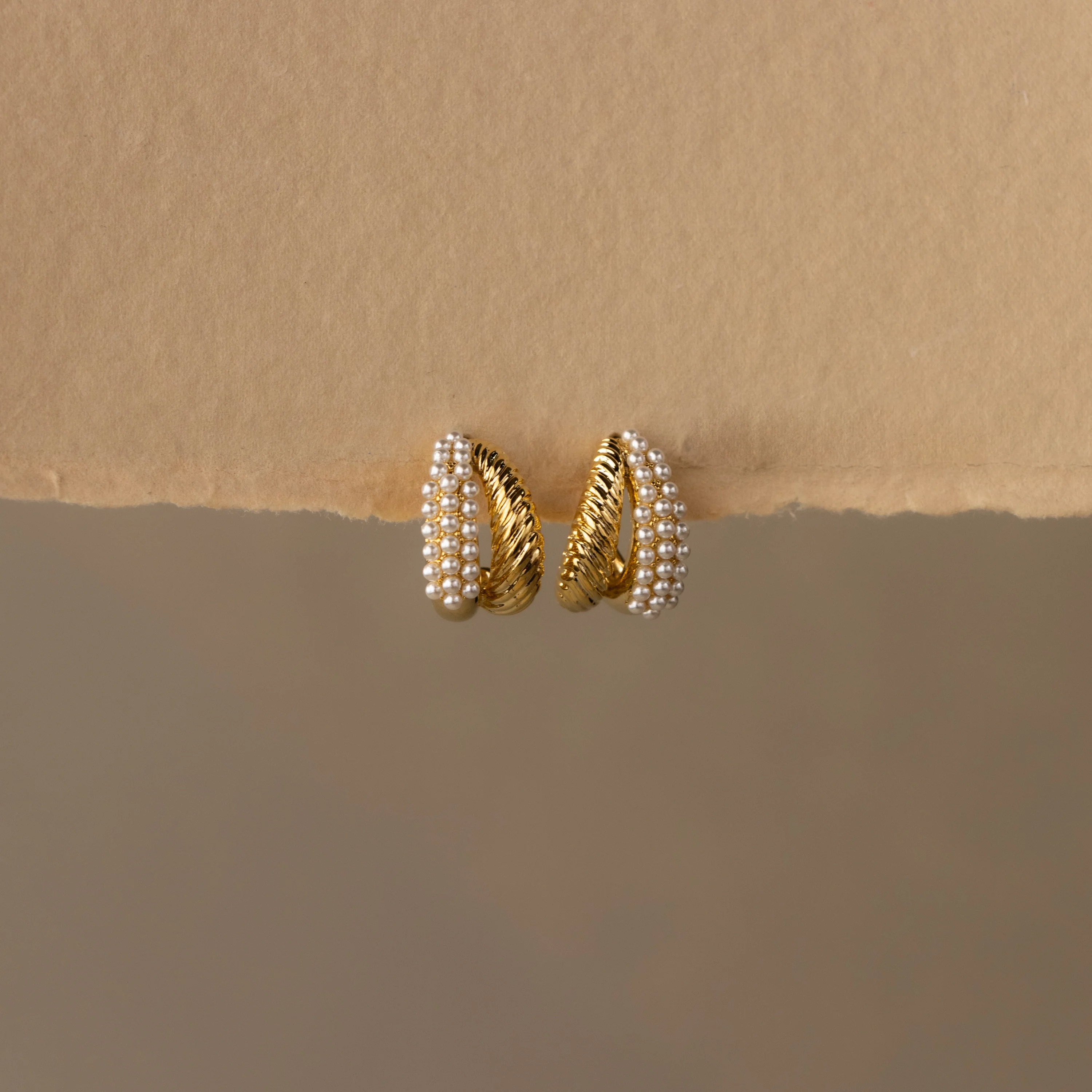 Twisted Pearl Row Hoop Studs